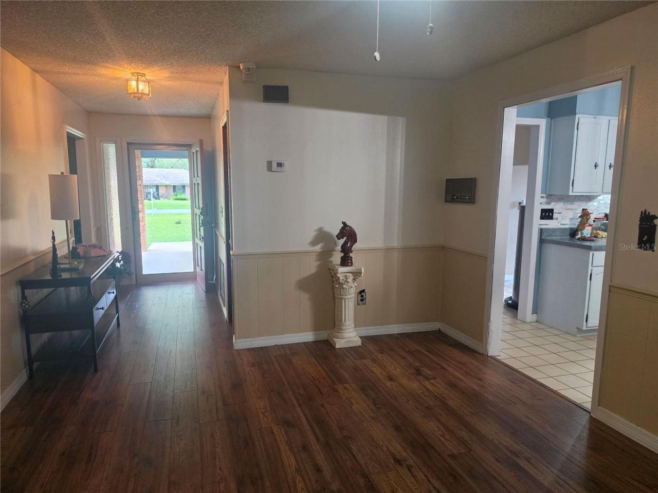 Photo 15 of 20: View from dining room towards the front door