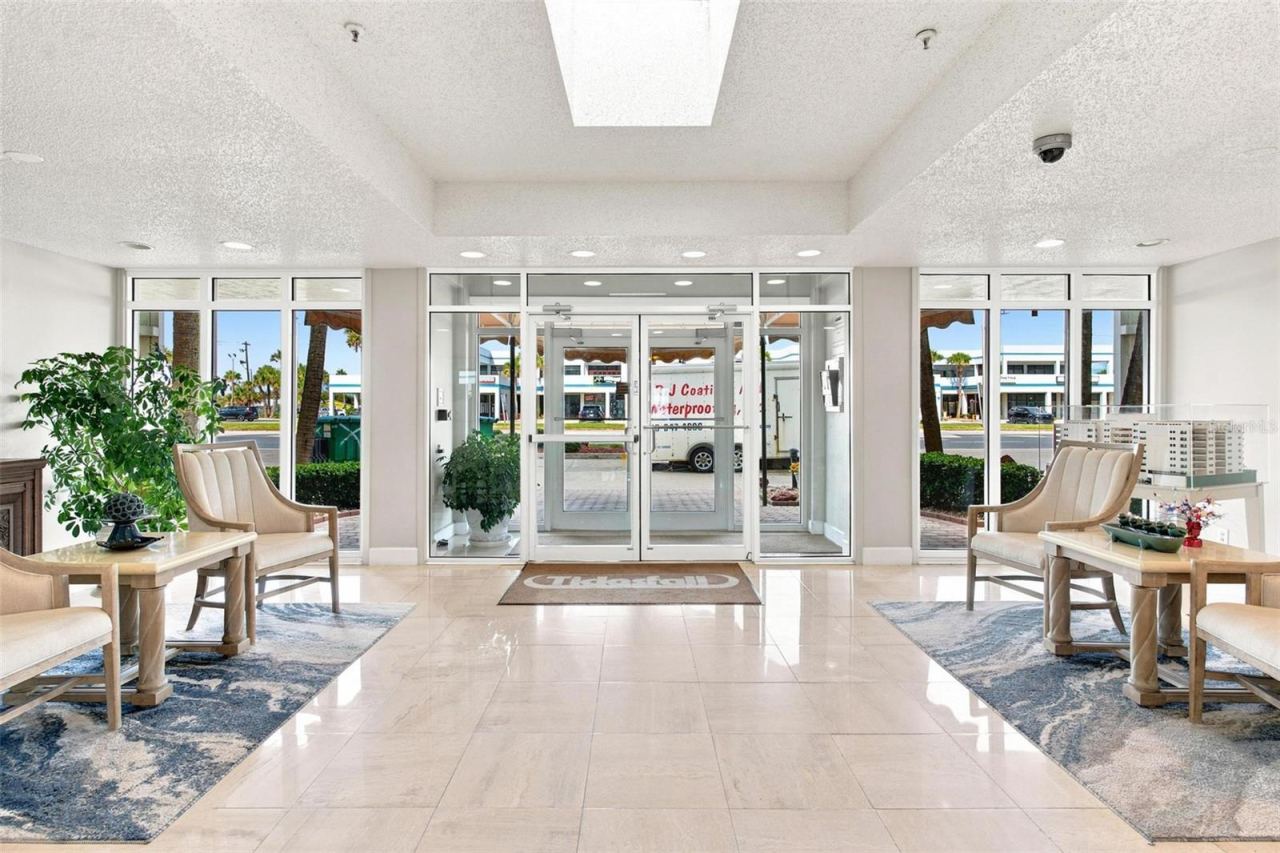 Photo 7 of 20: Community Entry/Foyer. Secured access throughout the building with elevator access.