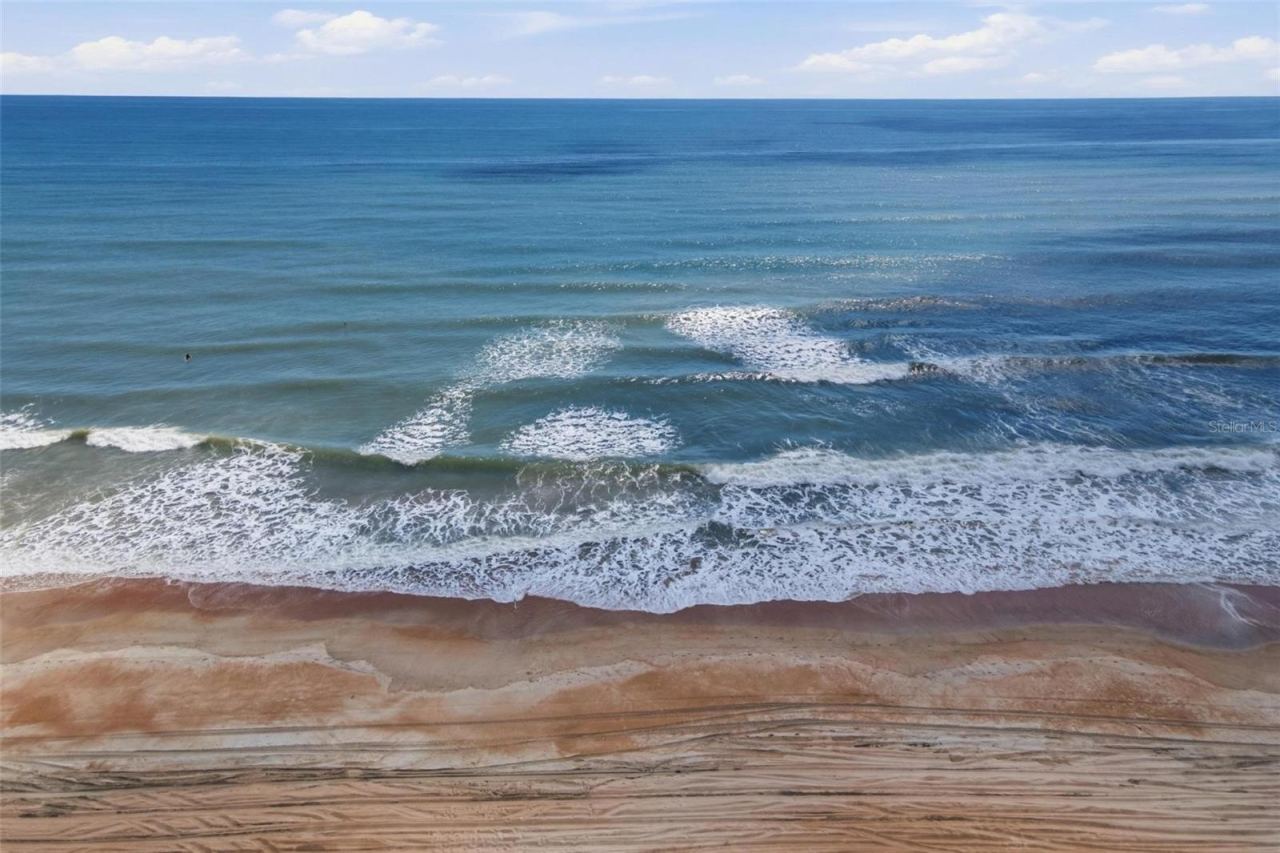 Photo 6 of 20: Imagine starting every morning with a walk on the beach in your backyard.