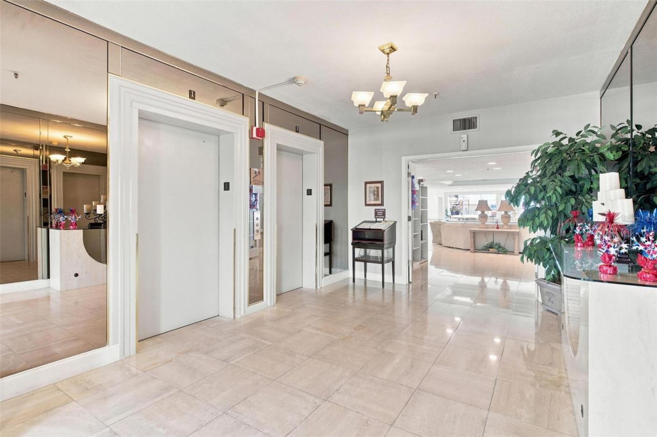 Photo 9 of 20: Community Entry/Foyer. Secured access throughout the building with elevator access.
