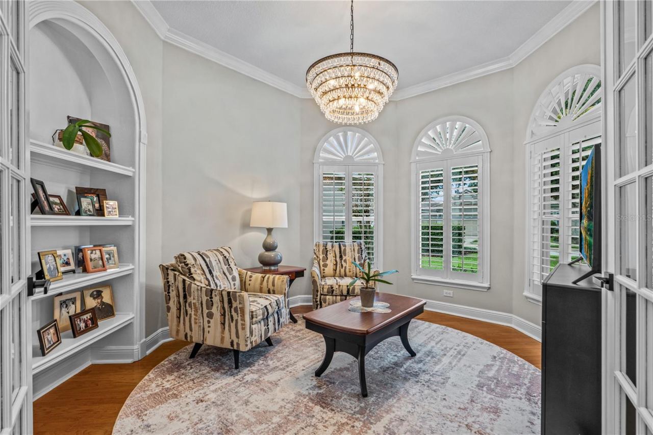 Photo 8 of 20: Currently used as a den, this would also make a great office with the built-in shelves; With all the windows, it's always light and bright