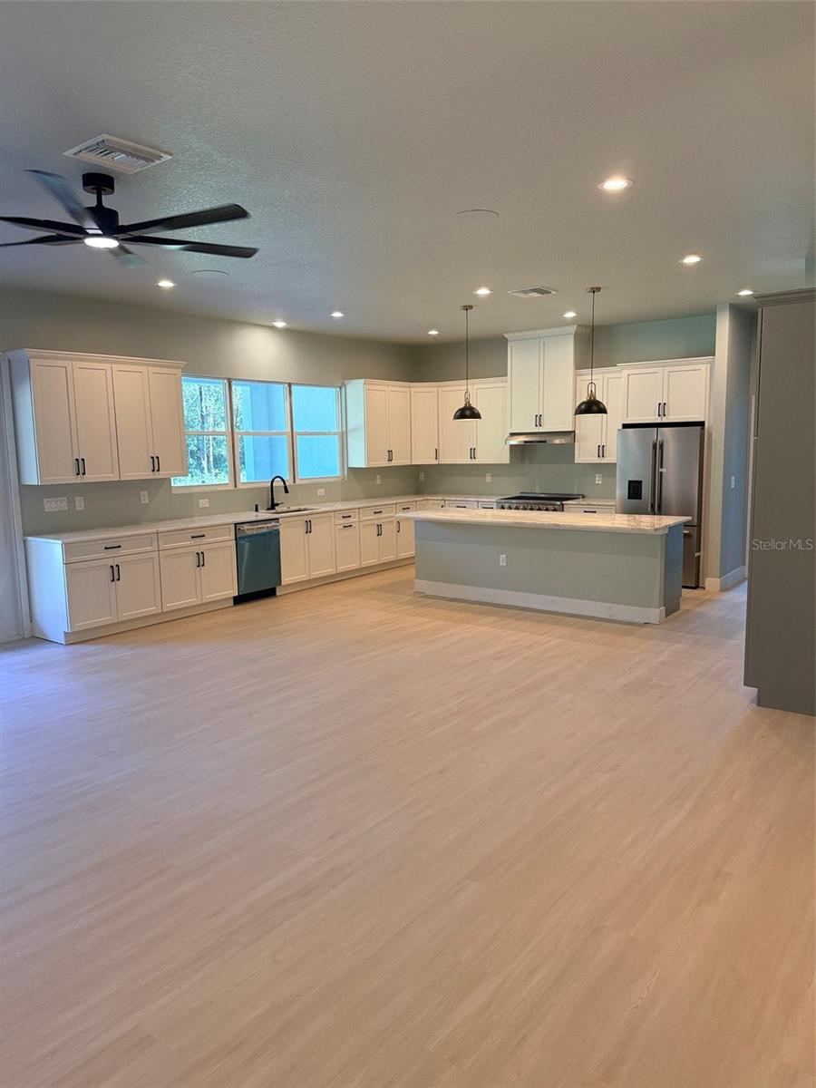 Photo 3 of 20: chef style kitchen with 8 foot island
