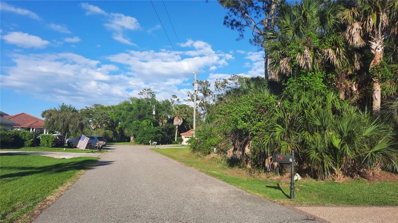 Photo 1 of 13: Cul-de-sac street/vacant lot on the right side