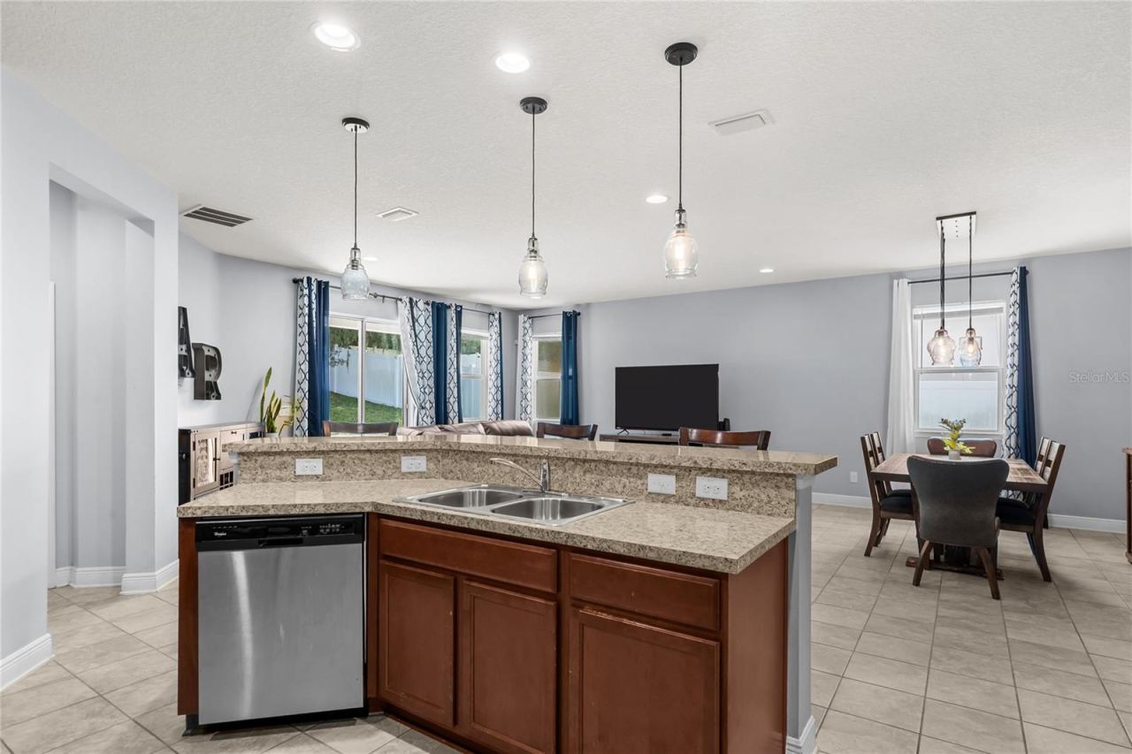 Photo 12 of 20: Kitchen Connects to Living/Dining Area