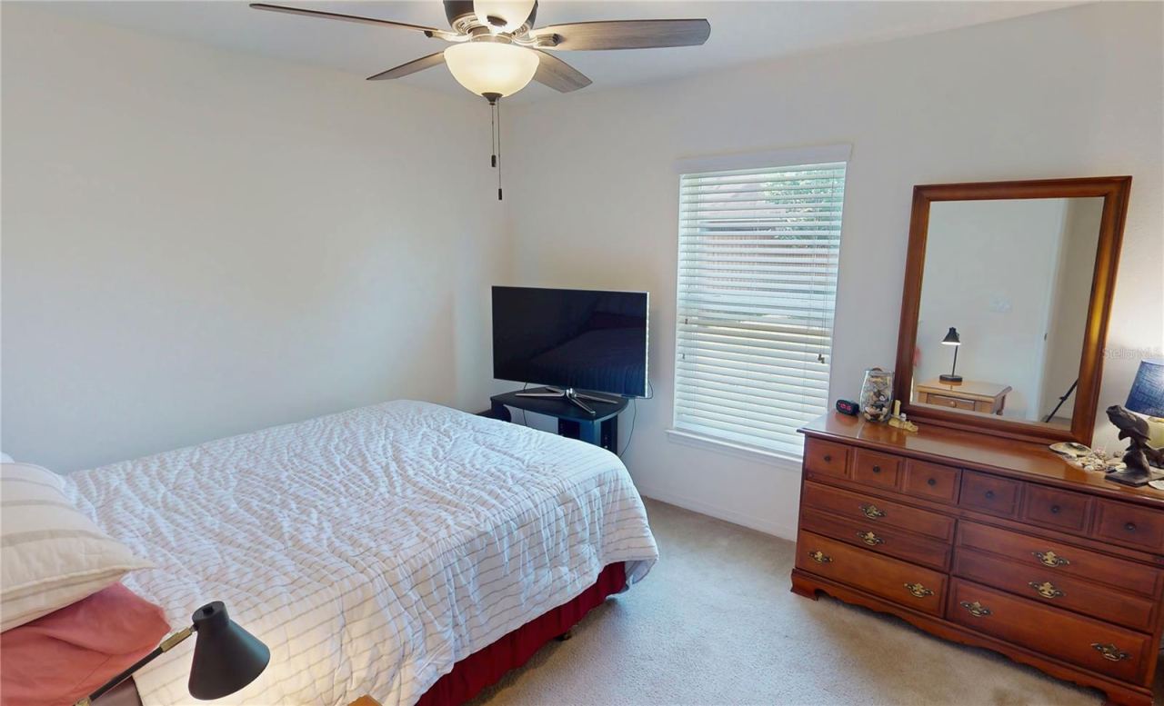 Photo 19 of 20: Back Bedroom overlooking private backyard
