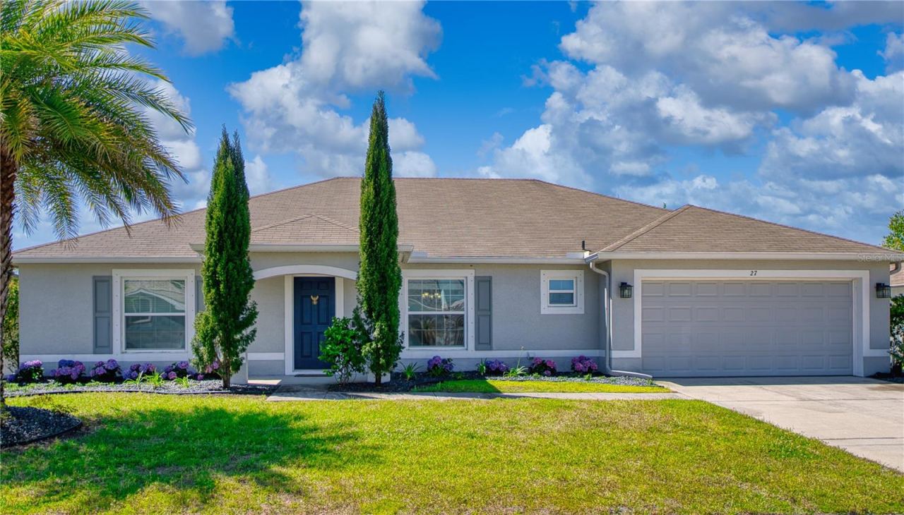 Photo 1 of 20: Inviting curb appeal with clean lines, attractive landscaping, and a welcoming covered entry that gives this home a polished, well-kept first impression.