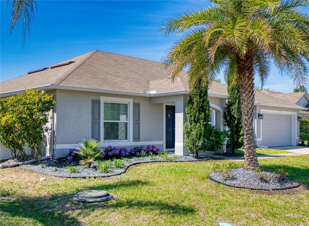 Photo 2 of 20: Charming exterior details include rain gutters, decorative shutters, and neatly defined landscaping that add character and a well-maintained feel to the home’s curb appeal.
