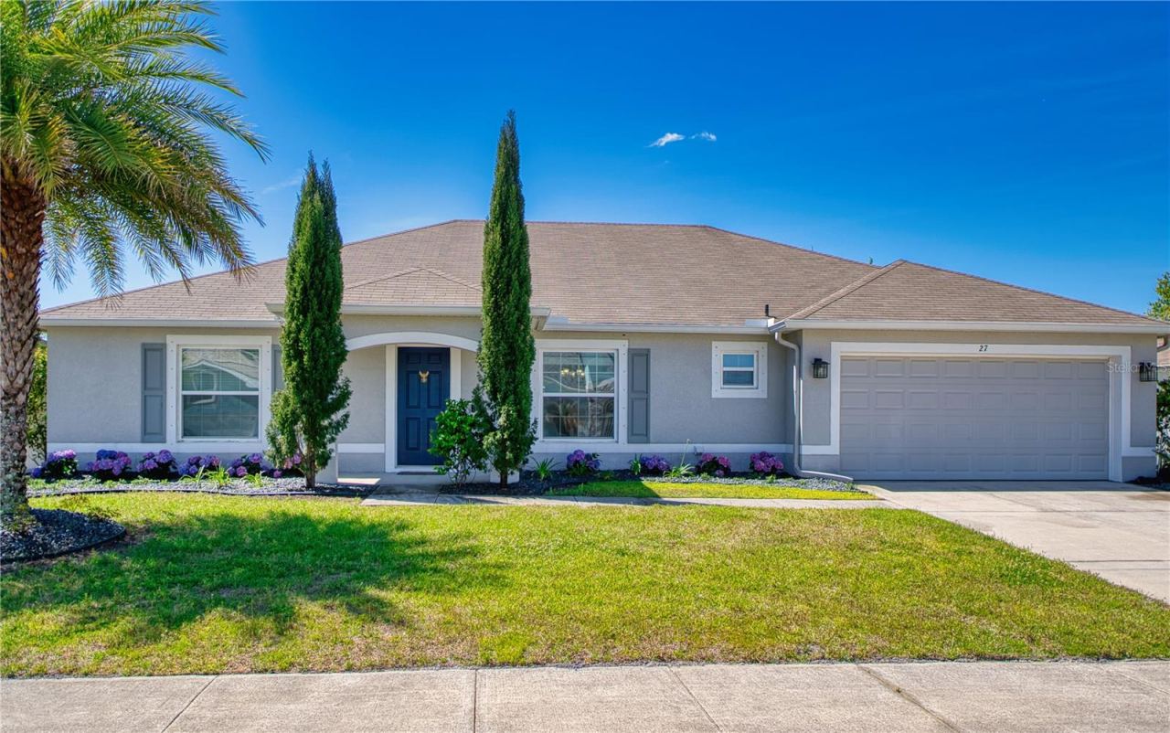 Photo 3 of 20: Set in desirable Matanzas Woods, this home enjoys the added appeal of underground utilities and sidewalks—an uncommon feature in Palm Coast—creating a polished neighborhood feel. Conveniently located near shopping, dining, parks, and schools, it is…