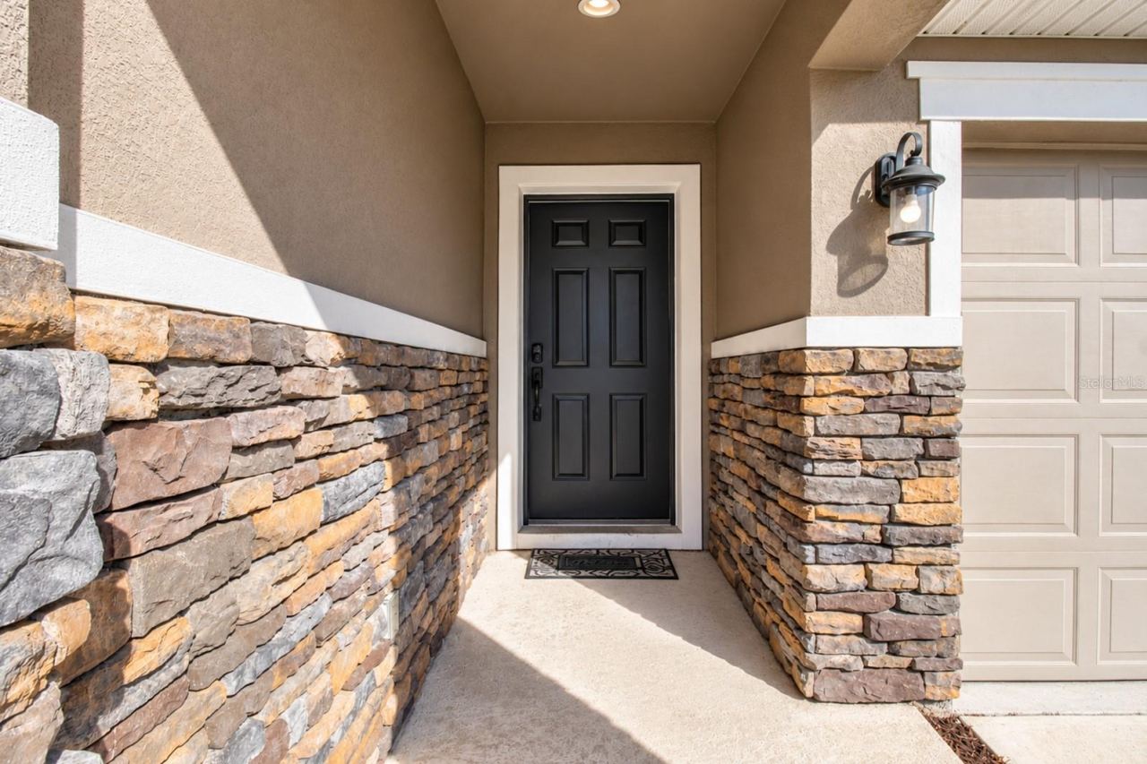 Photo 4 of 20: Exterior stone accents