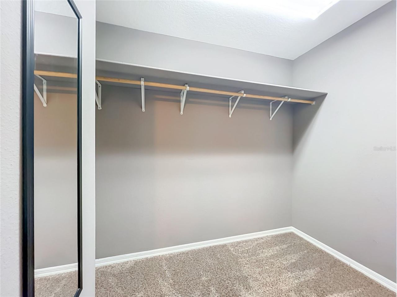 Photo 15 of 20: Primary Bedroom Walk-In Closet