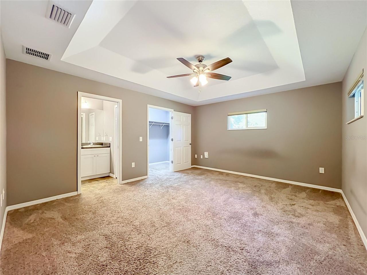 Photo 14 of 20: Primary Bedroom (Check Out the Large Walk-In Closet)