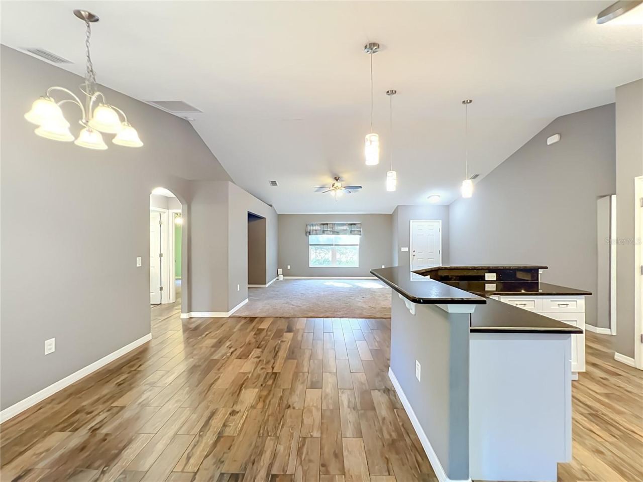Photo 10 of 20: View into Living/Family Room (Kitchen Counter Ready for Barstools)