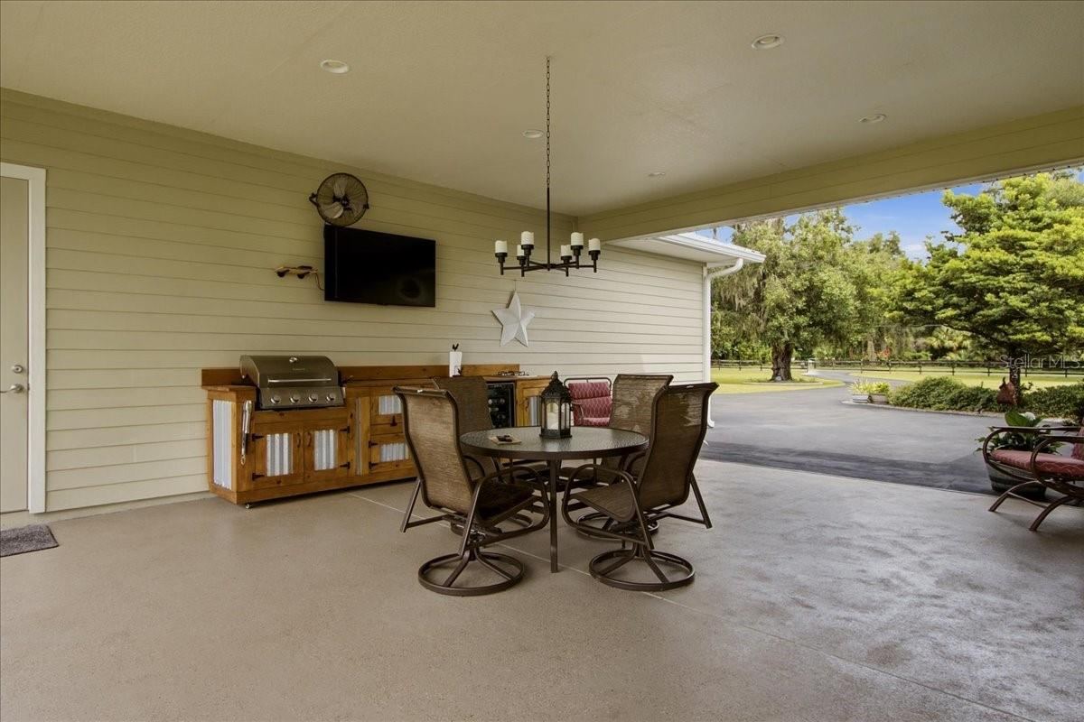 Photo 12 of 20: Breezeway complete with Chandelier, Tv & Fan