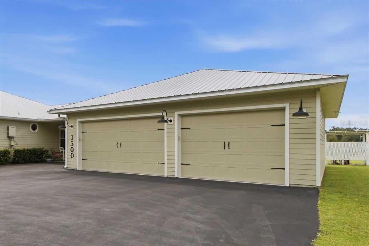 Photo 7 of 20: View of Garage & Drive Way