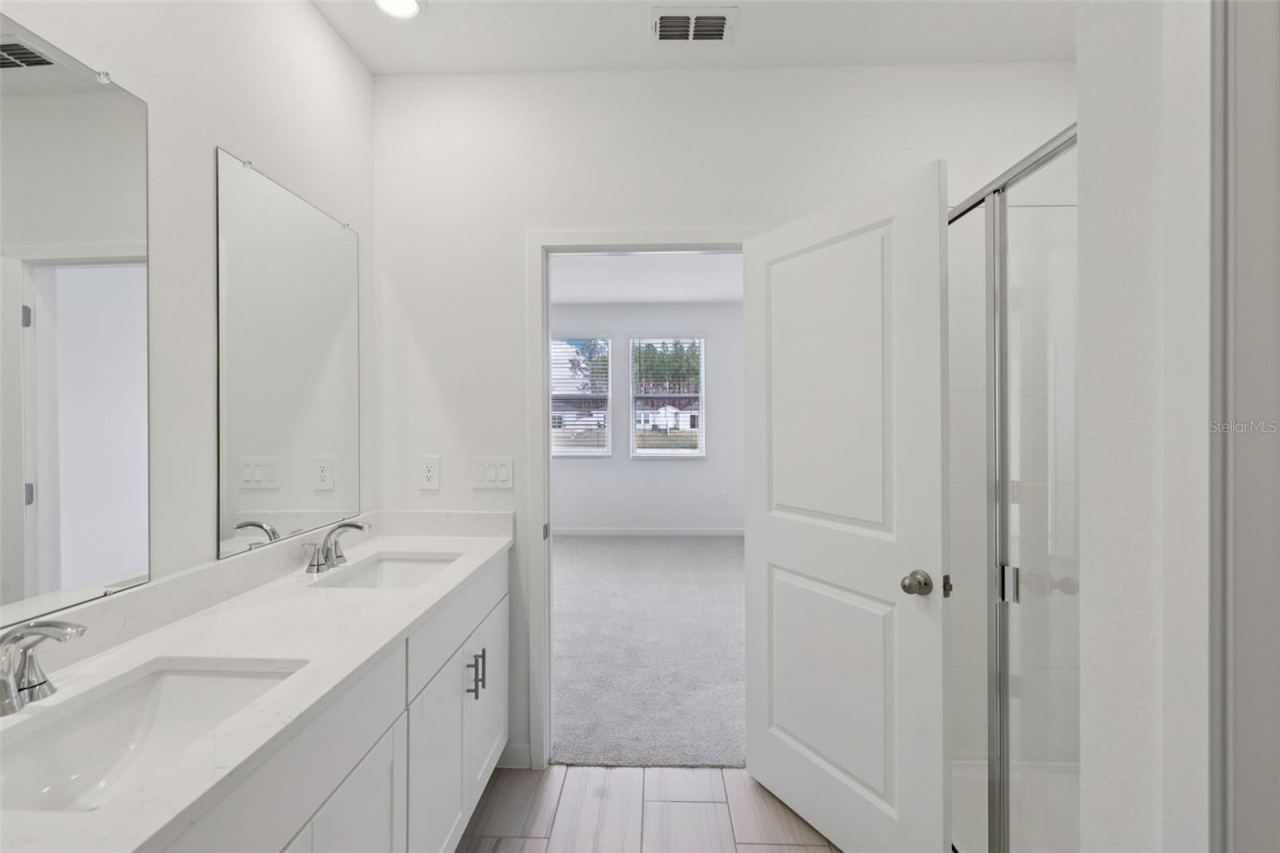 Photo 17 of 20: The interior photos are of another home with the same floor plan but different interior color package finishes. Some details may vary