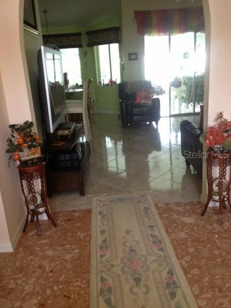 Photo 12 of 20: Foyer to Great room