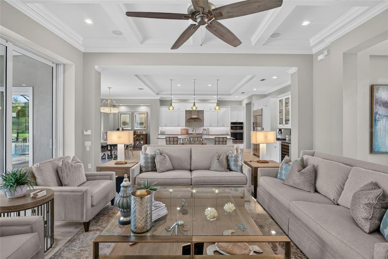 Photo 14 of 20: An airy, beautifully connected living space where conversation carries from the kitchen to the great room and life unfolds with an easy sense of luxury.