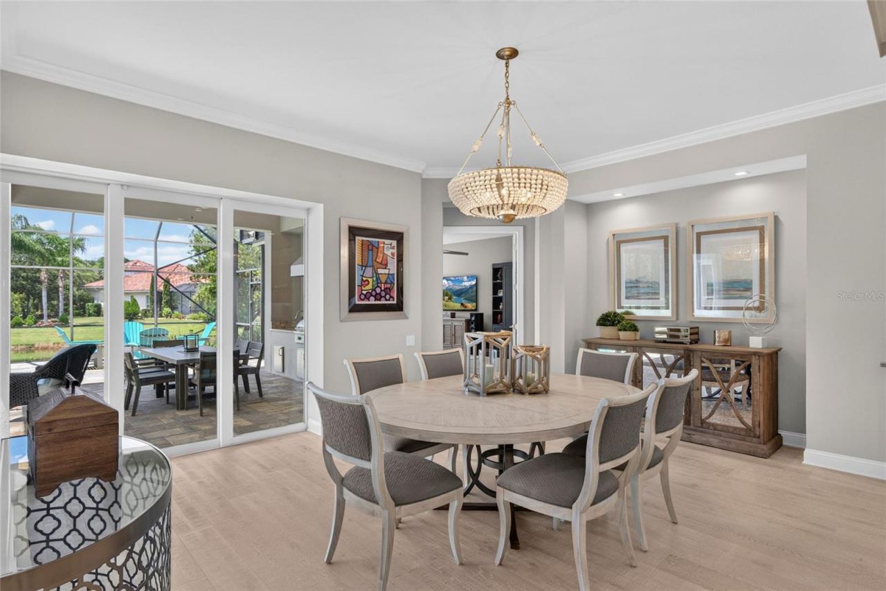 Photo 7 of 20: Designed for effortless connection, the dining area flows beautifully into the living room and kitchen, creating one sophisticated space where dinner, conversation, and entertaining come together.