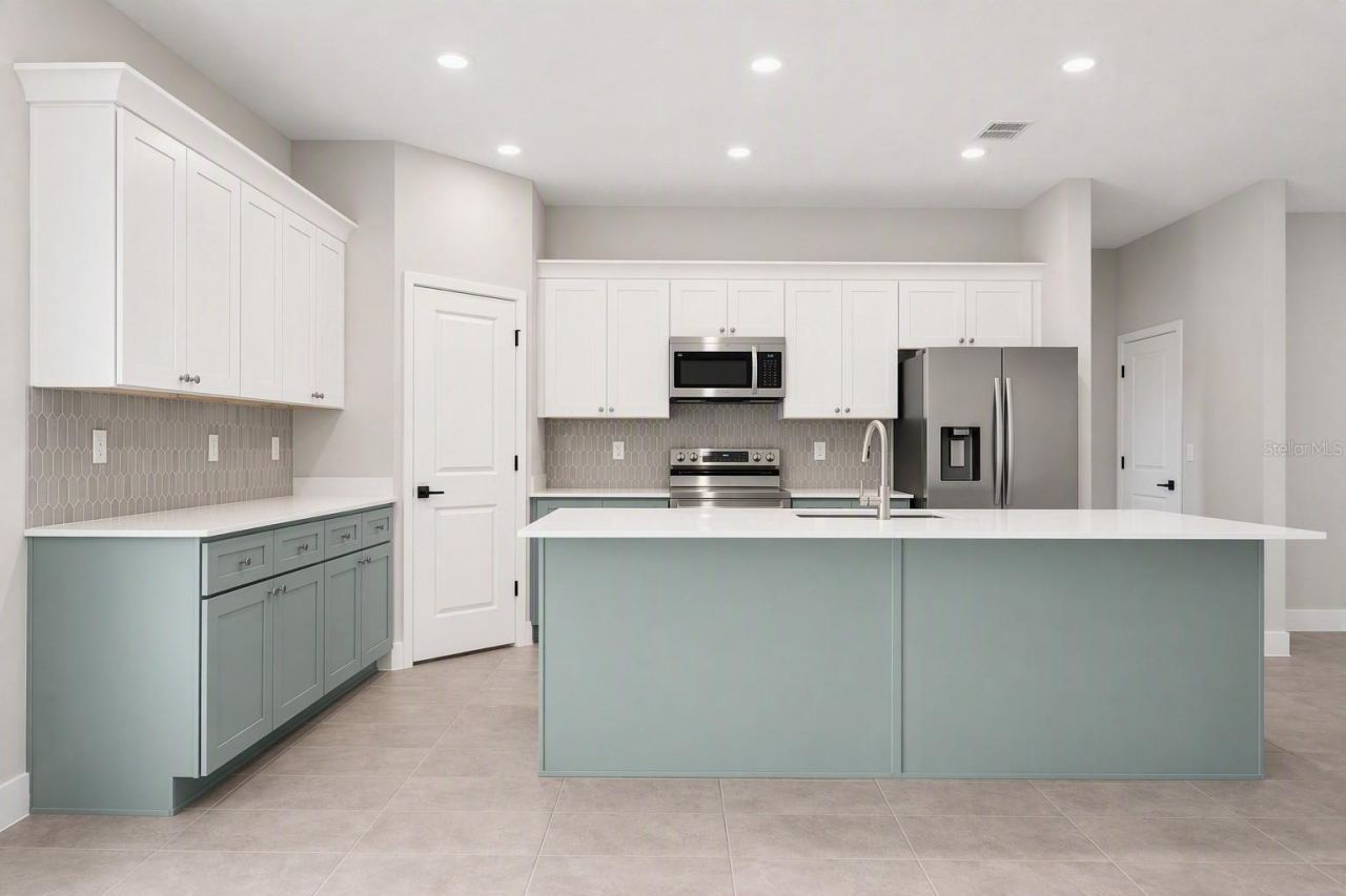 Photo 5 of 13: KITCHEN. COLOR AND FINISHES MAY VARY.
