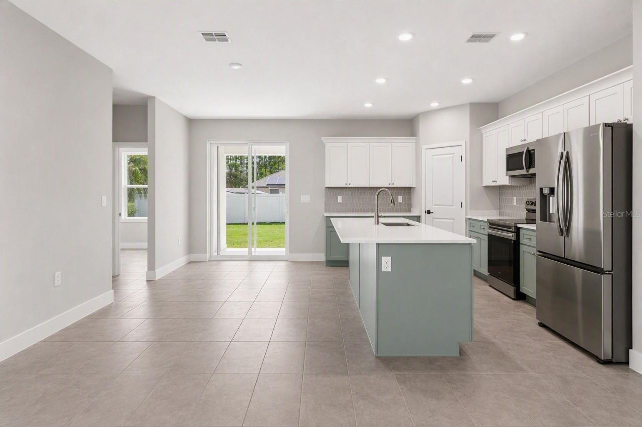 Photo 7 of 13: KITCHEN. COLOR AND FINISHES MAY VARY.