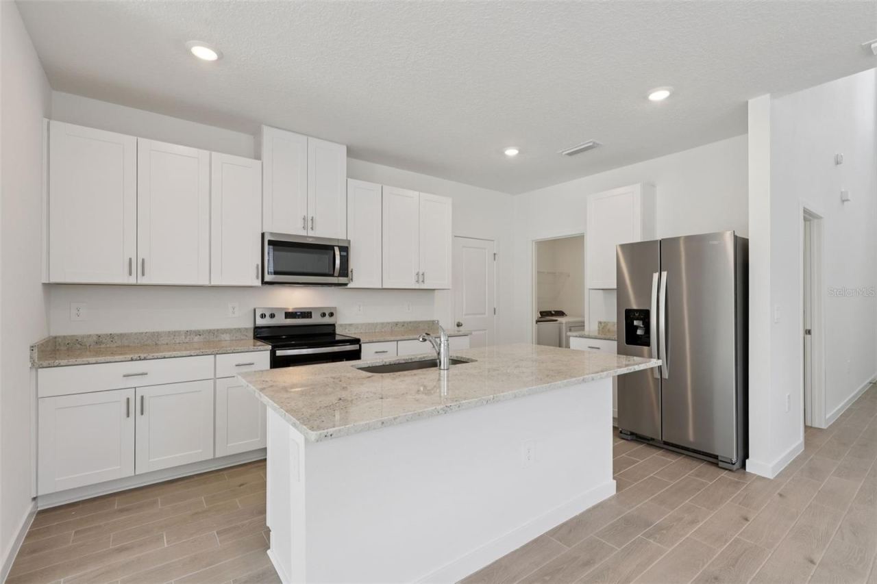 Photo 9 of 18: The interior photos are of another home with the same floor plan and interior finishes. Some details may vary