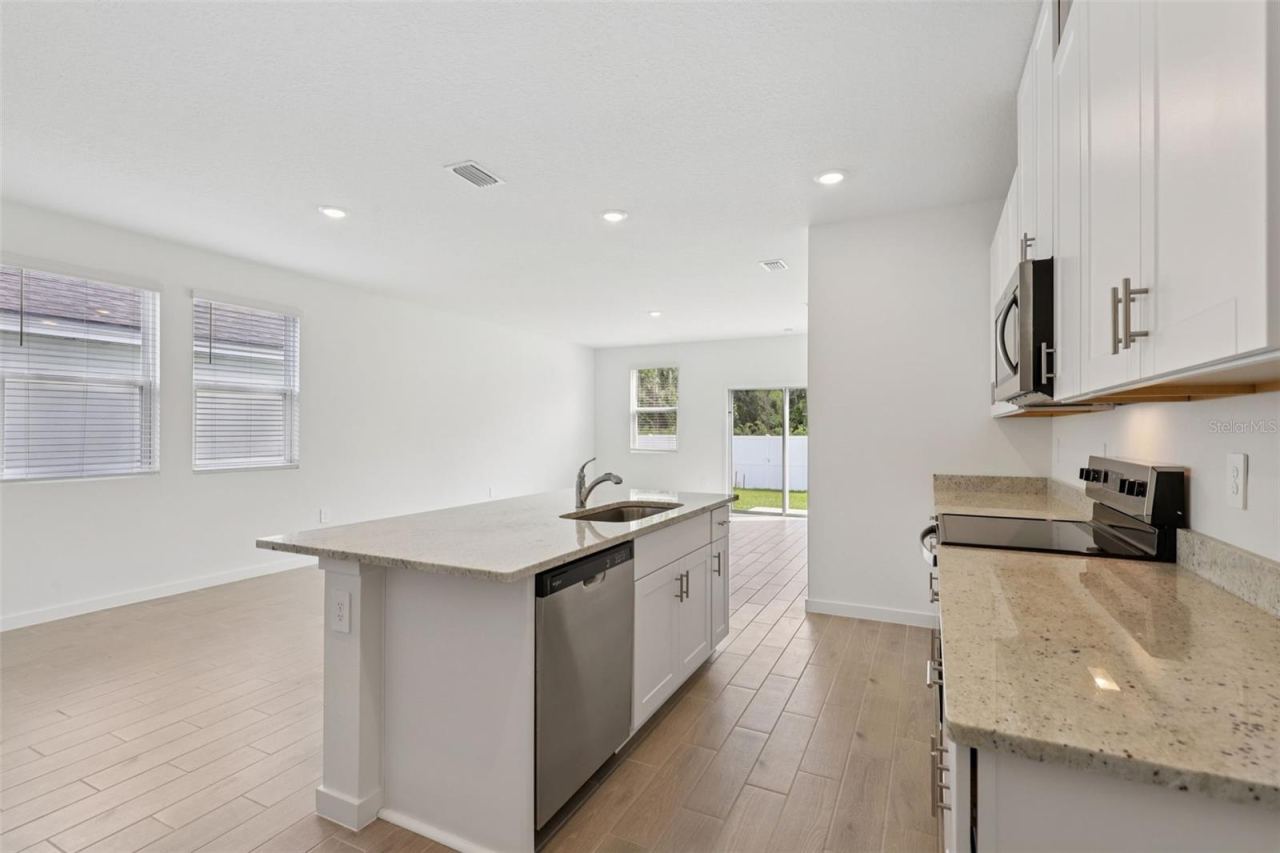 Photo 10 of 18: The interior photos are of another home with the same floor plan and interior finishes. Some details may vary