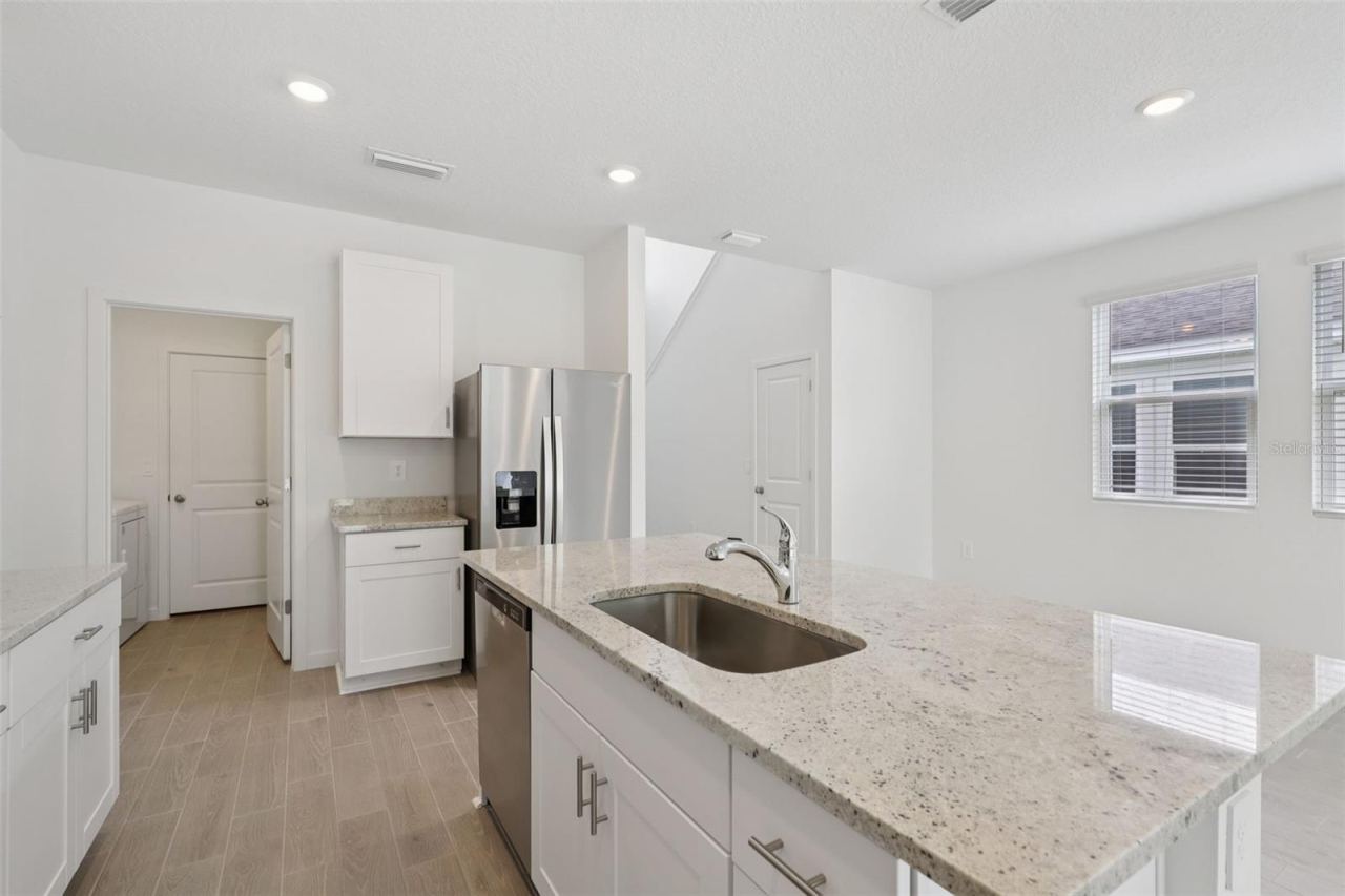 Photo 11 of 18: The interior photos are of another home with the same floor plan and interior finishes. Some details may vary