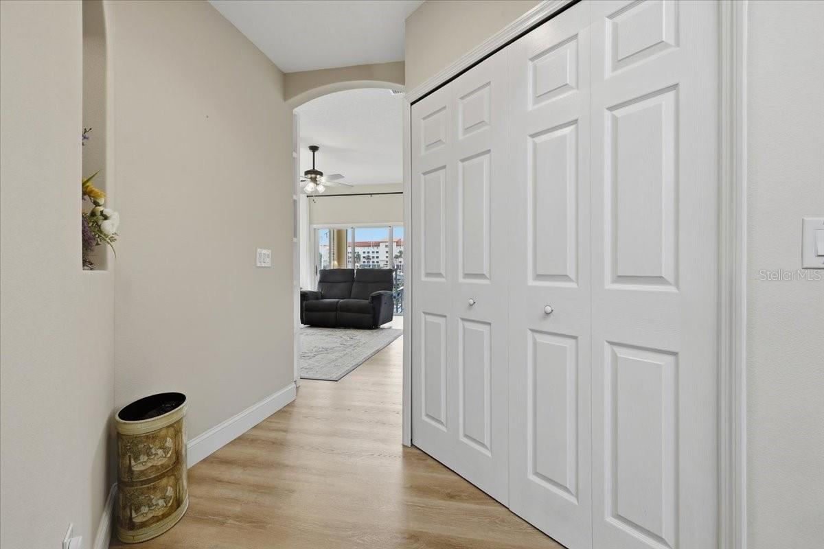 Photo 9 of 20: Foyer leading to family room and kitchen