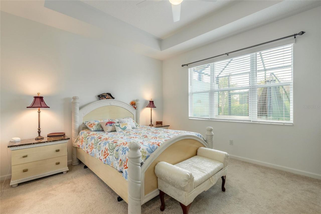 Photo 18 of 20: Spacious primary bedroom with lots of natural light