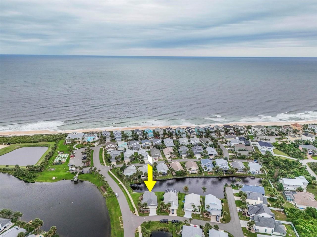 Photo 4 of 20: Aerial view Steps to BEACH -Clubhouse heated pool and spa