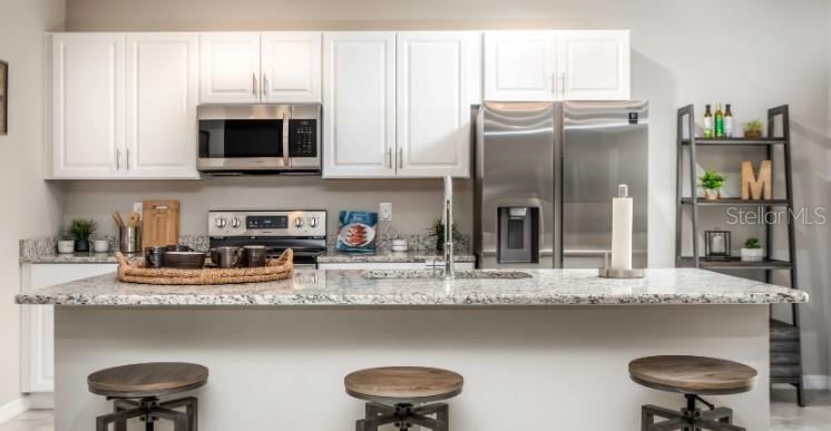Photo 5 of 20: Model home - actual features may vary.