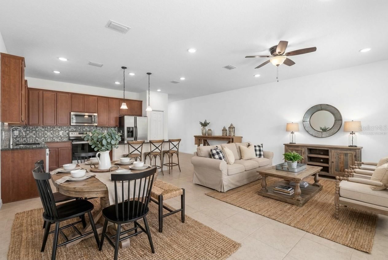 Photo 2 of 20: Open-concept living, dining, and kitchen area. Virtually Staged