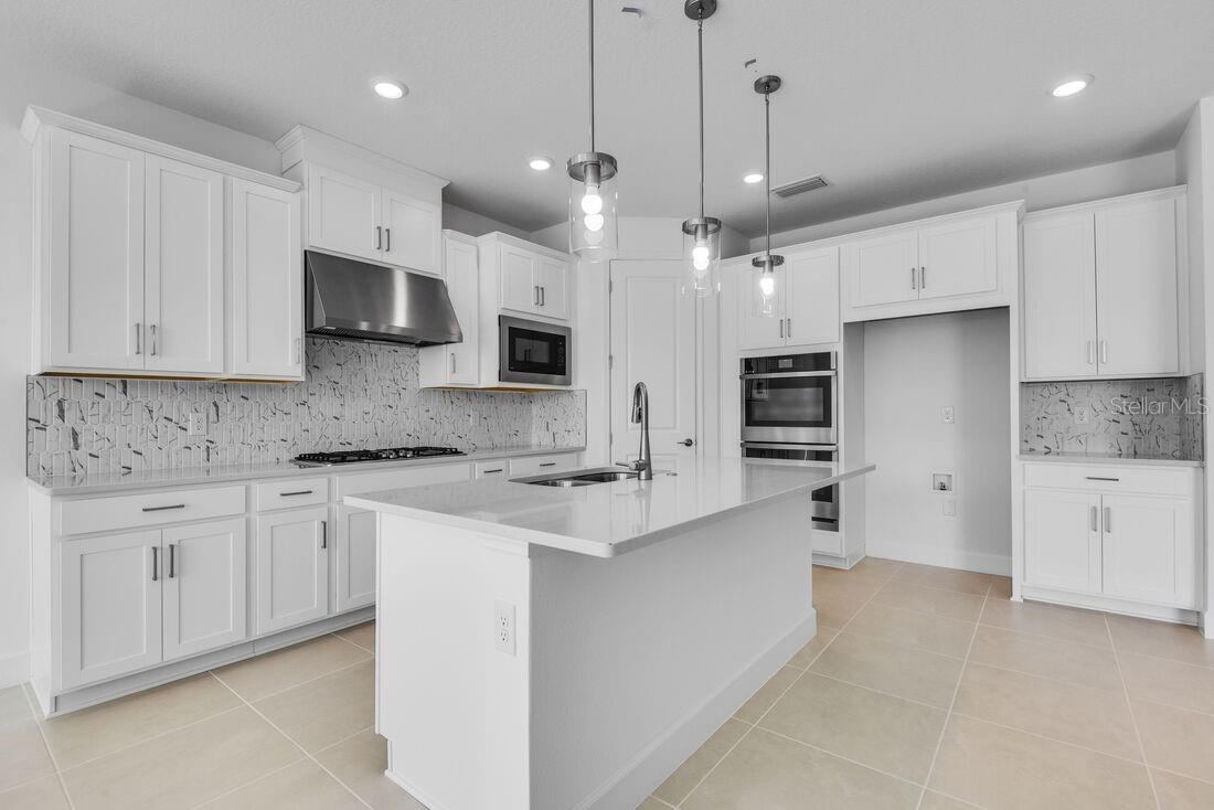 Photo 4 of 20: 672 Junonia Boulevard - Ready Now!