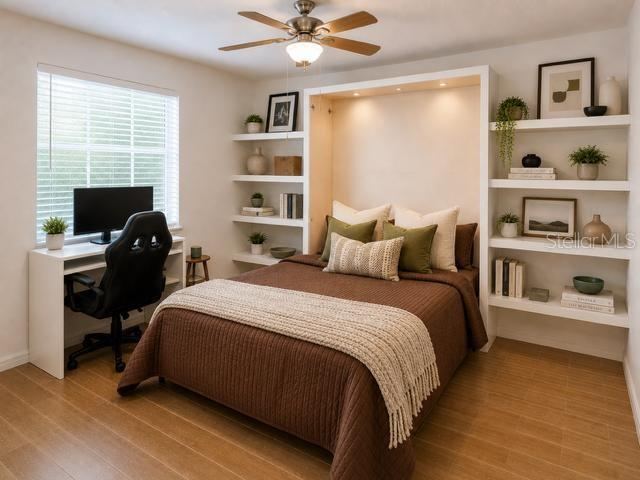 Photo 9 of 19: Bedroom 2 with Murphy Bed in wall