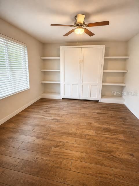 Photo 11 of 19: Bedroom 2 with Murphy Bed up, as a Flex Room also