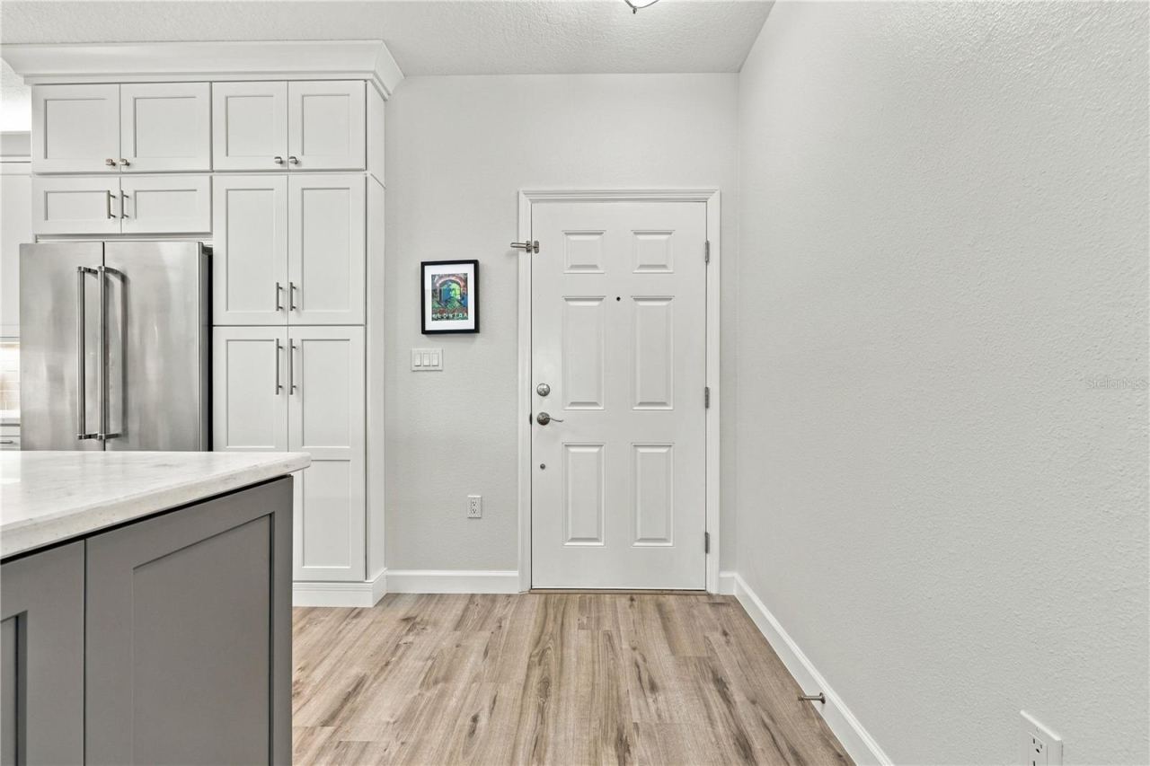 Photo 6 of 20: Kitchen Entry & Custom Cabinetry