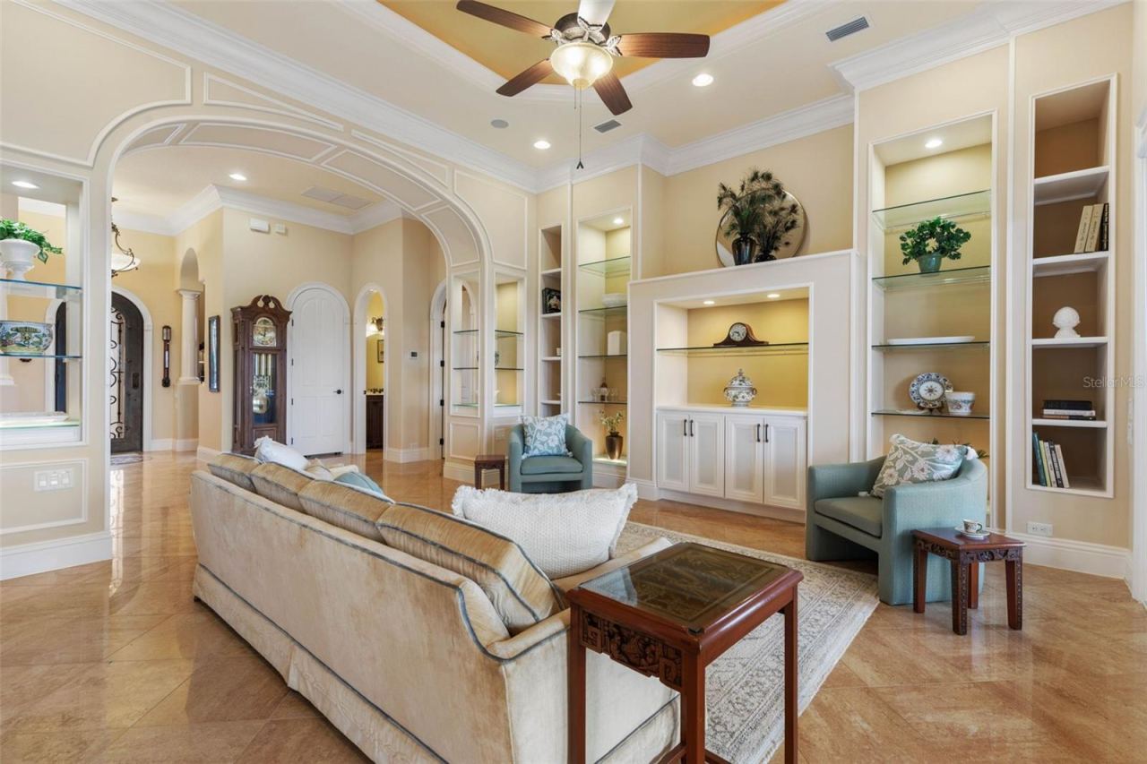 Photo 15 of 20: Living Room with custom cabinetry and lit built-ins