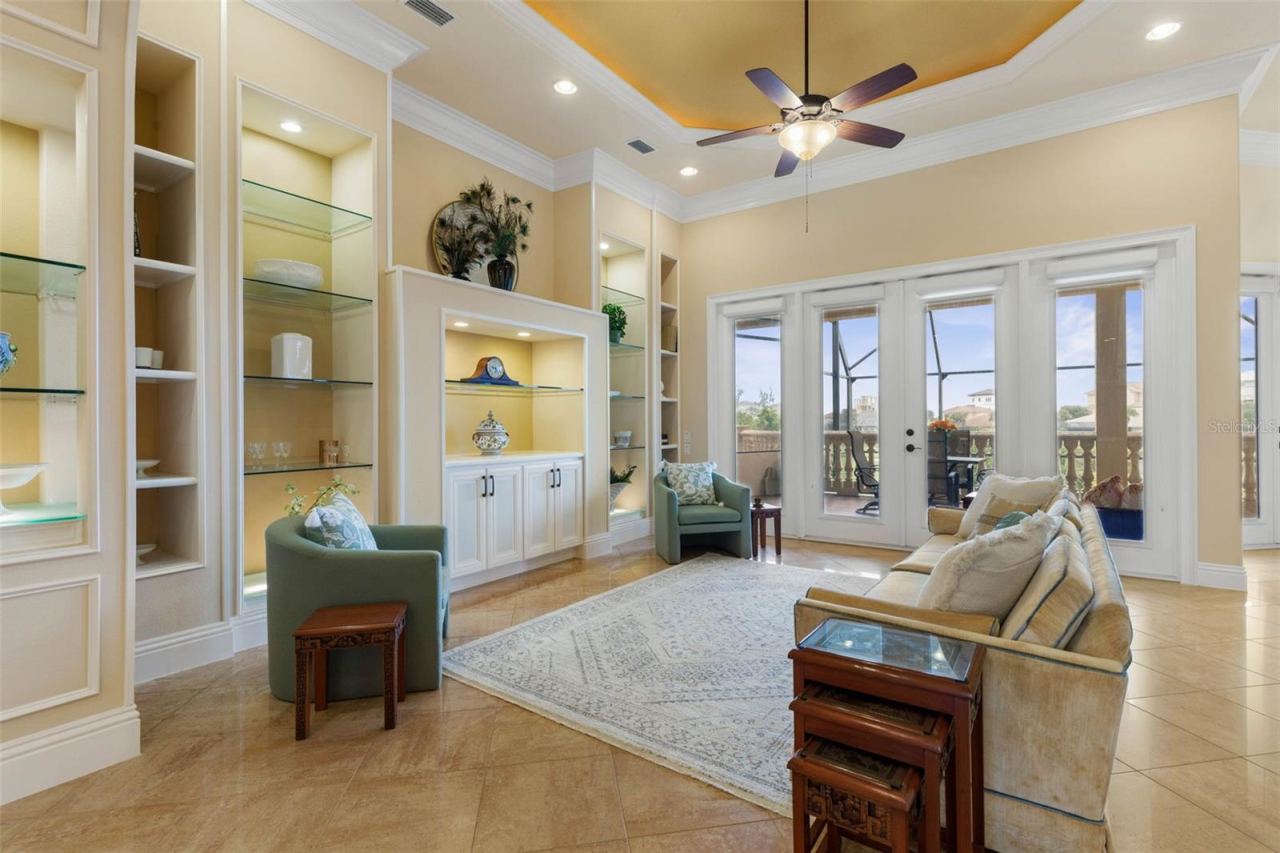 Photo 12 of 20: Living Room with custom cabinetry and lit built-ins
