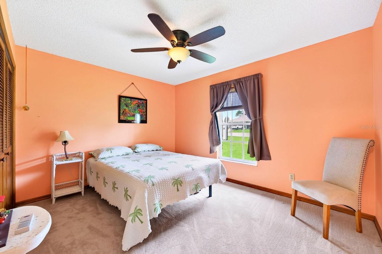 Photo 20 of 20: Bedroom 2 is perfectly sized for use as a guest room, hobby space of home office.