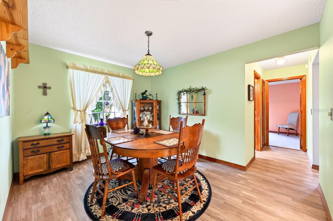 Photo 7 of 20: A FORMAL DINING ROOM provides a dedicated space for hosting dinners and special occasions.