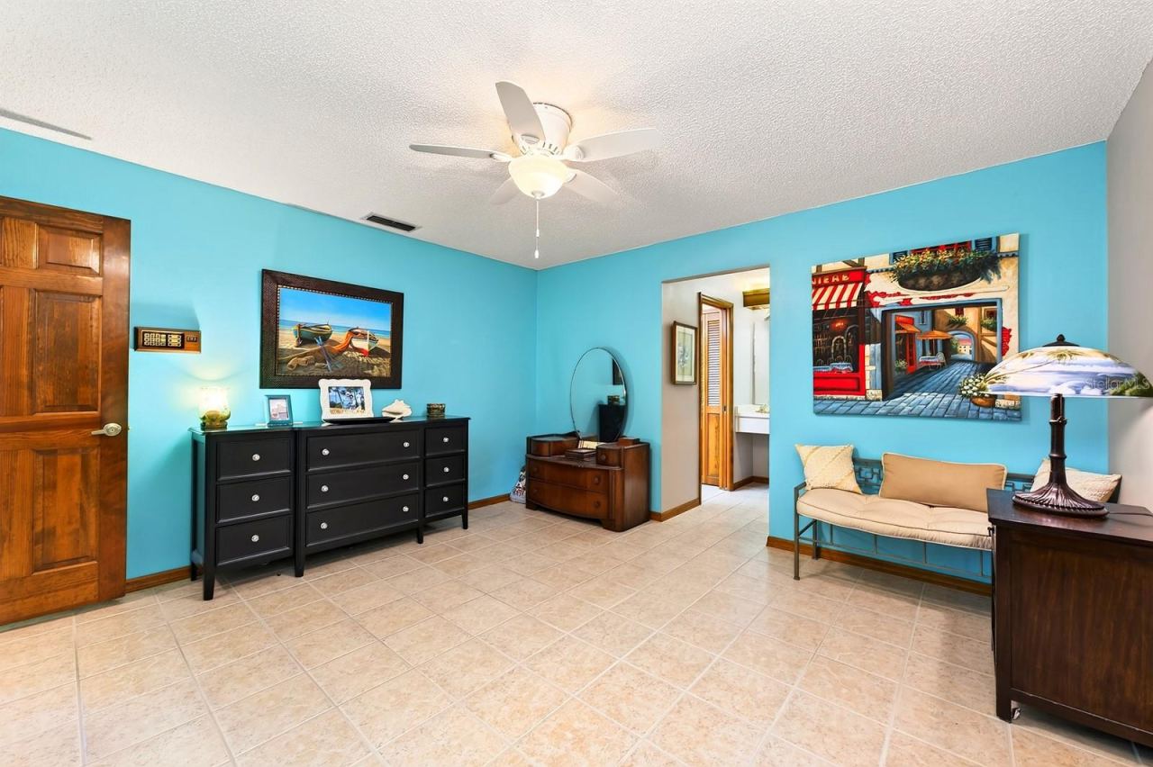 Photo 16 of 20: The SPLIT-BEDROOM FLOOR PLAN provides added privacy with the Primary Bedroom featuring a GENEROUS WALK-IN CLOSET and an en suite Bath.