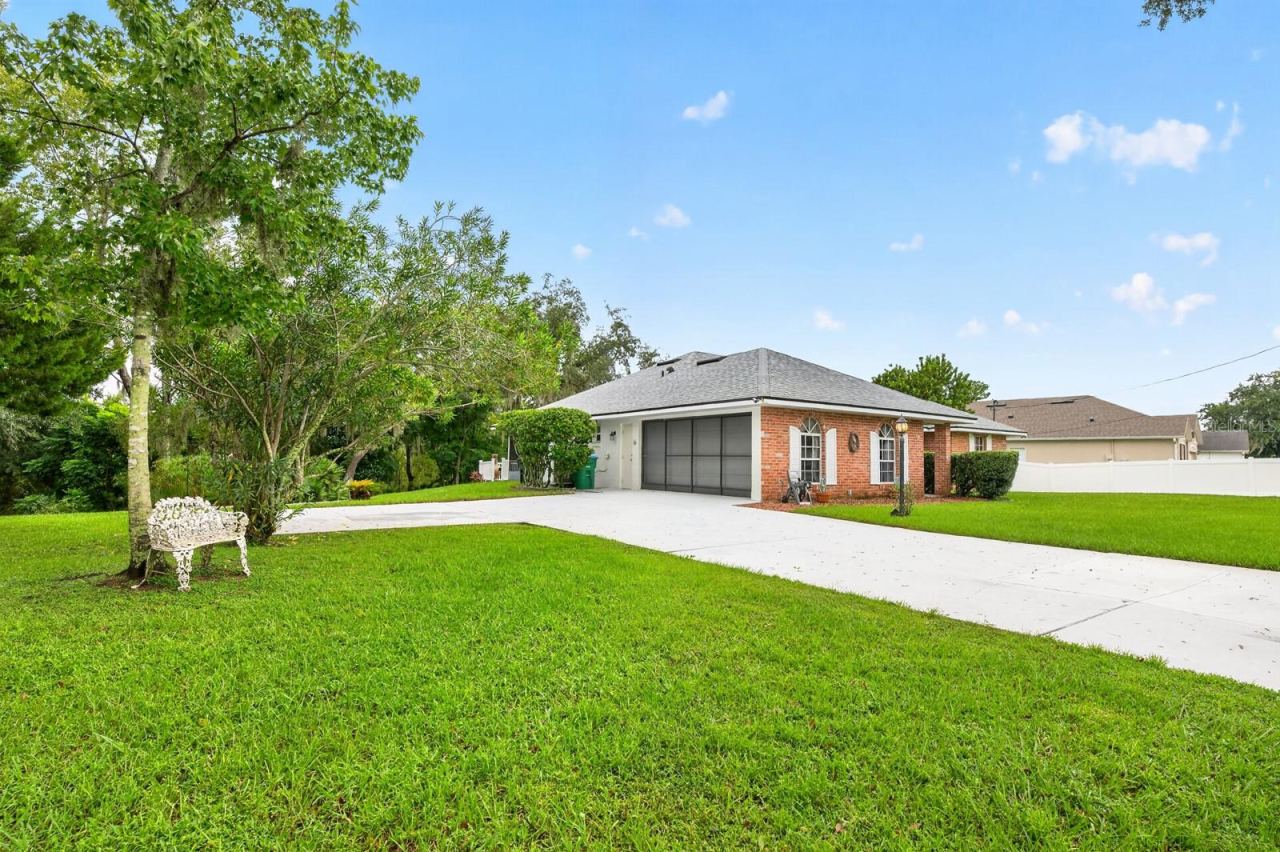 Photo 2 of 20: Situated in a HIGH AND DRY LOCATION, the home boasts GREAT CURB APPEAL with attractive brick facing.