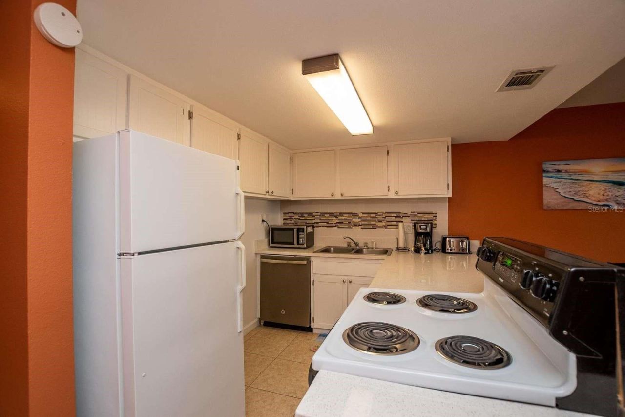 Photo 11 of 20: KITCHEN WITH BEACHY CABINETS