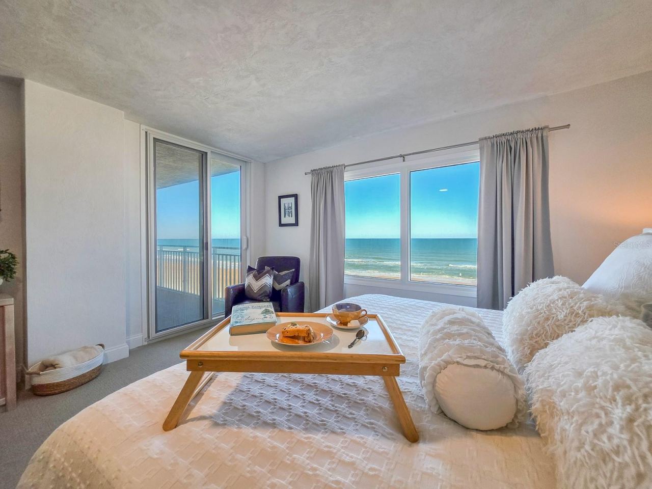Photo 3 of 20: Primary Suite with sparkeling ocean views.