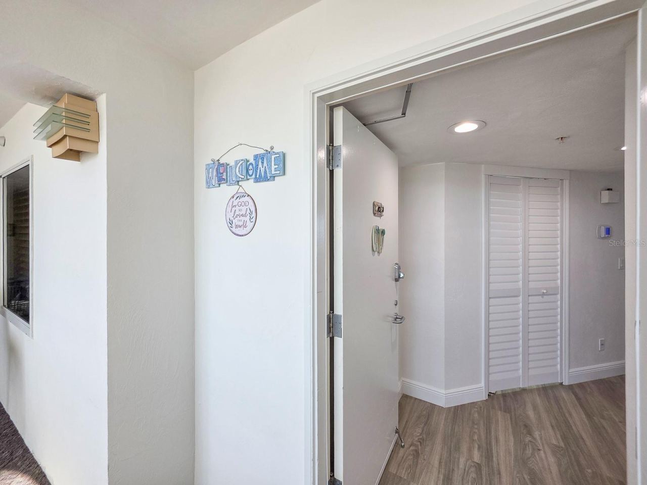 Photo 9 of 20: Welcome home. Foyer view of hallway closet as you're entering paradise.