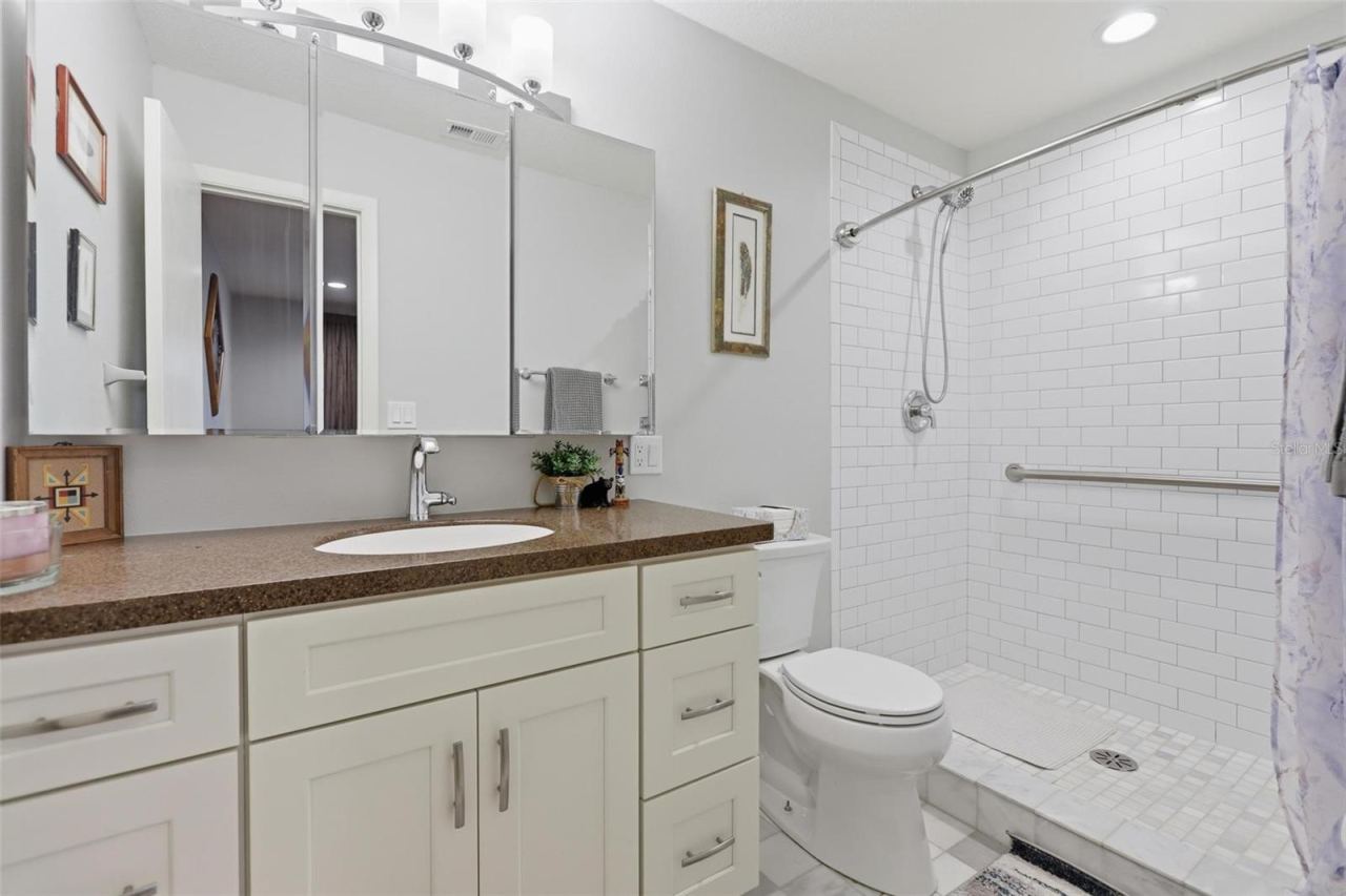Photo 18 of 20: Primary Bath with Accessible Handrail