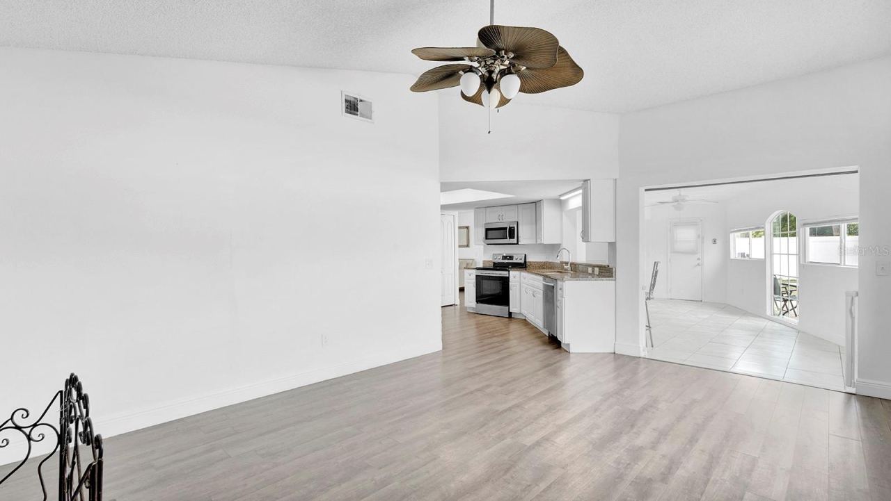 Photo 12 of 20: family room looking into kitchen and florida room
