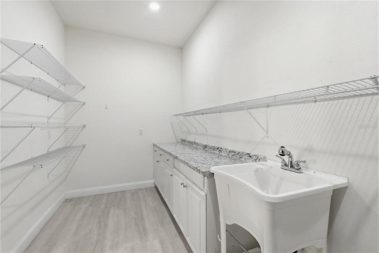 Photo 18 of 20: Walk-in pantry with Laundry Room