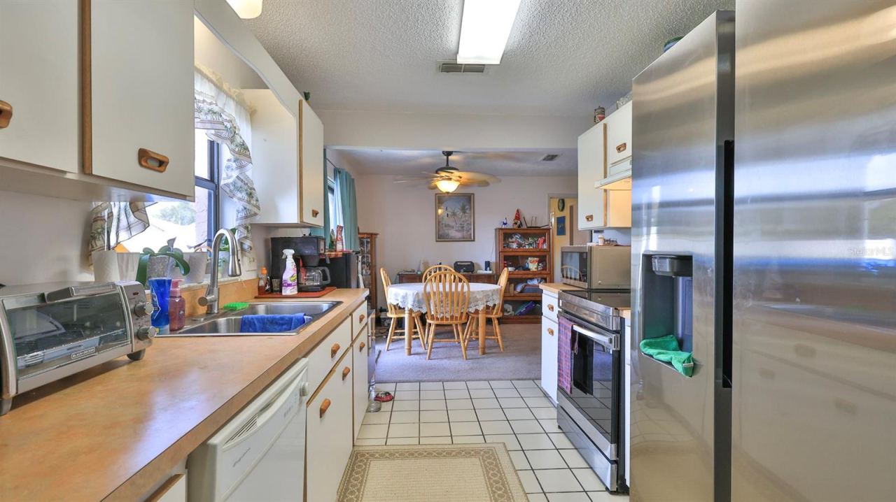 Photo 12 of 20: Kitchen to Dining Area