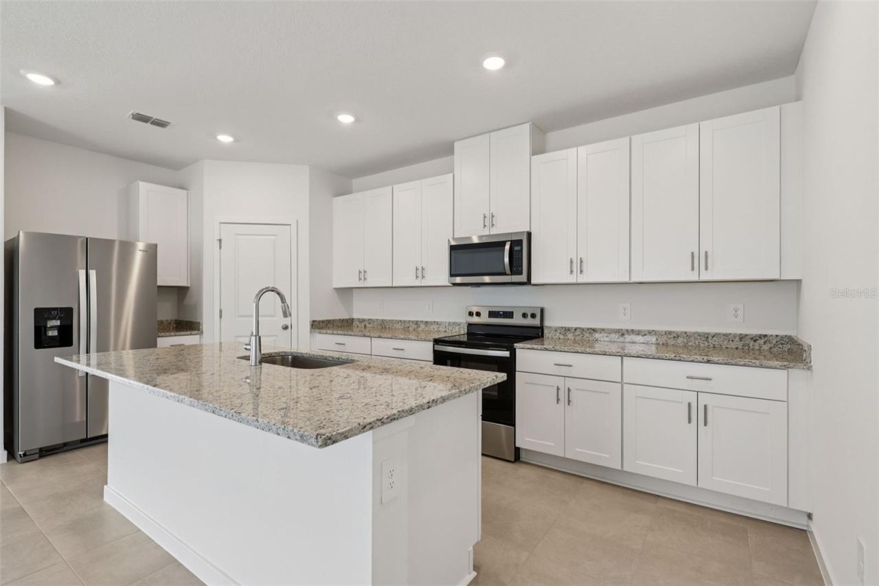 Photo 4 of 10: Photo is not of the actual home, but is an inspirational photo of builder’s model home and may depict options, furnishings, and/or decorator features that are not included